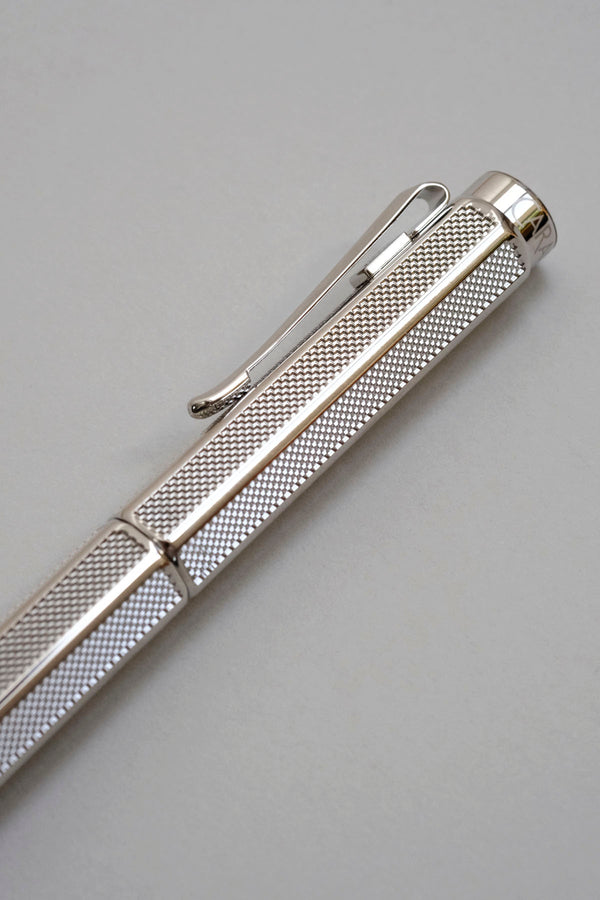 Cap with clip of the Caran d'Ache Ecridor Milanese Mesh fountain pen with an engraved barrel.