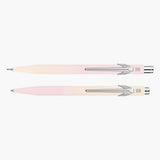 A pen and pencil set in shades of orange and pink.