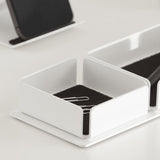 White MYOKO desk tray by Hido, with two paper clips inside.