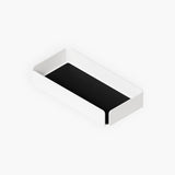 A white steel office accessories tray, finished inside with black felt.