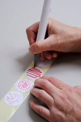 Creating unique illustrations for stickers used in Luna gift sets.