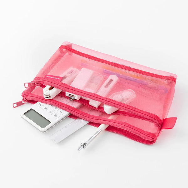 A pink pencil case made from semi-transparent mesh, filled with office supplies.