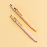 Caran d'Ache pen and pencil with a silver clip and the brand logo.