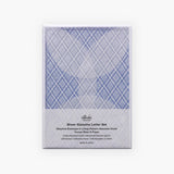 Packaging of a letter-writing set with envelopes made from semi-transparent paper and decorative sheets for concealing the content of the letter, in blue.
